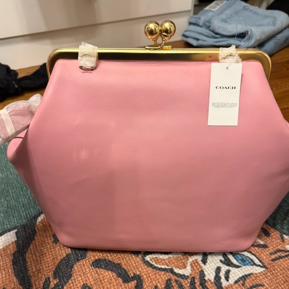 Coach Handbags - Coach Kisslock Frame large in Pink!